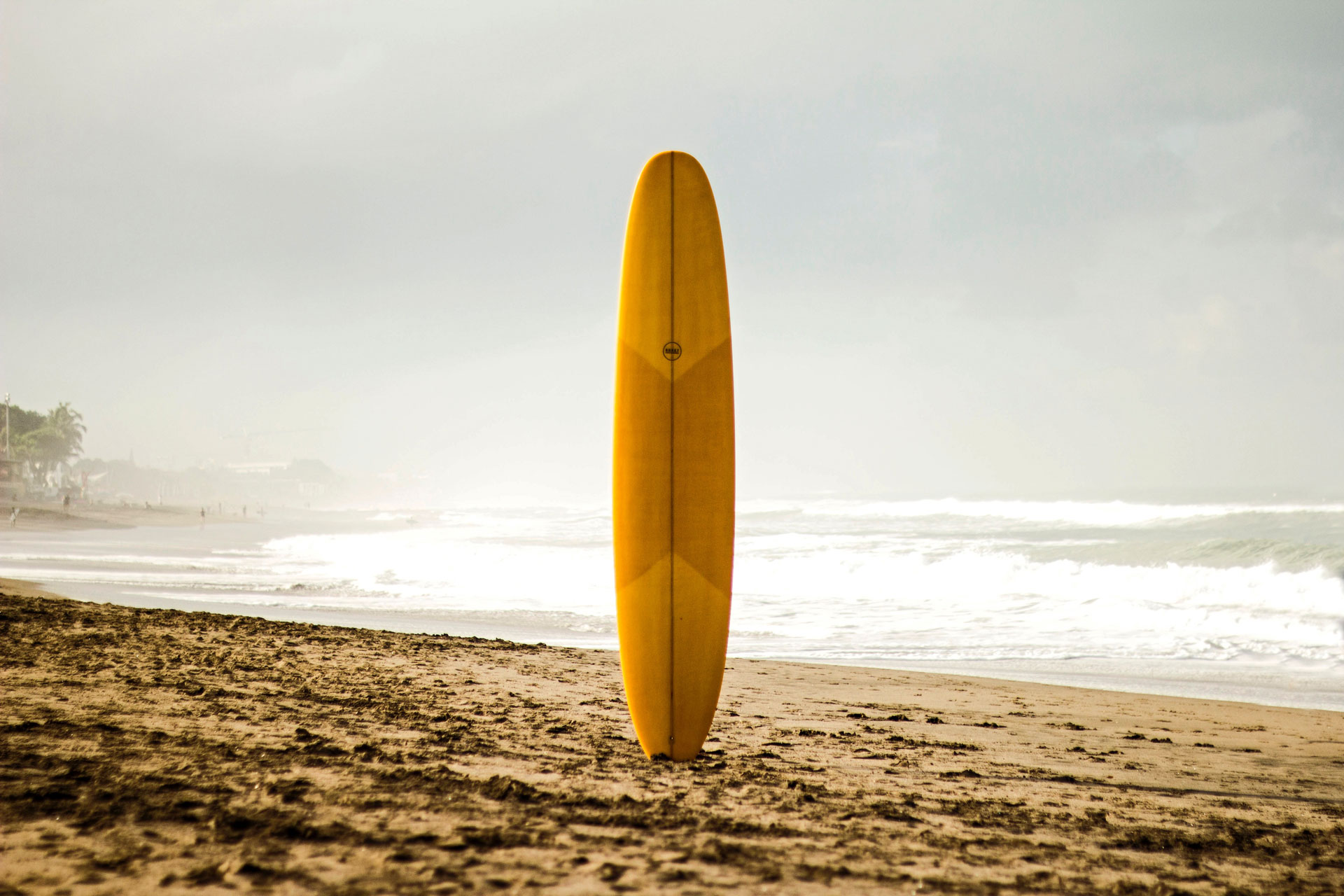 Surfboard in sand image