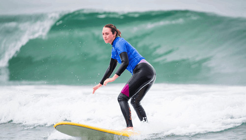 Female surfer learns to surf